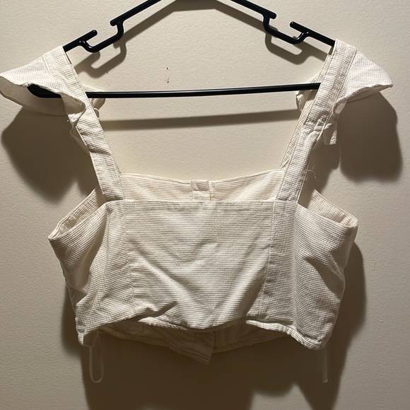 White Crop Top with Button-up Front and Ruffled Sleeve Caps - Picture 7 of 9